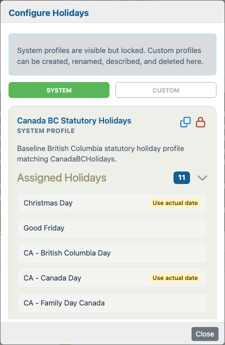 Assigned Holidays section expanded for a system holiday profile